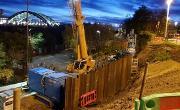 Construction of the retaining wall on Dame Dorothy Street to facilitate future road widening. Sheet piles are being pushed 13 metres into the ground to support the widened road.